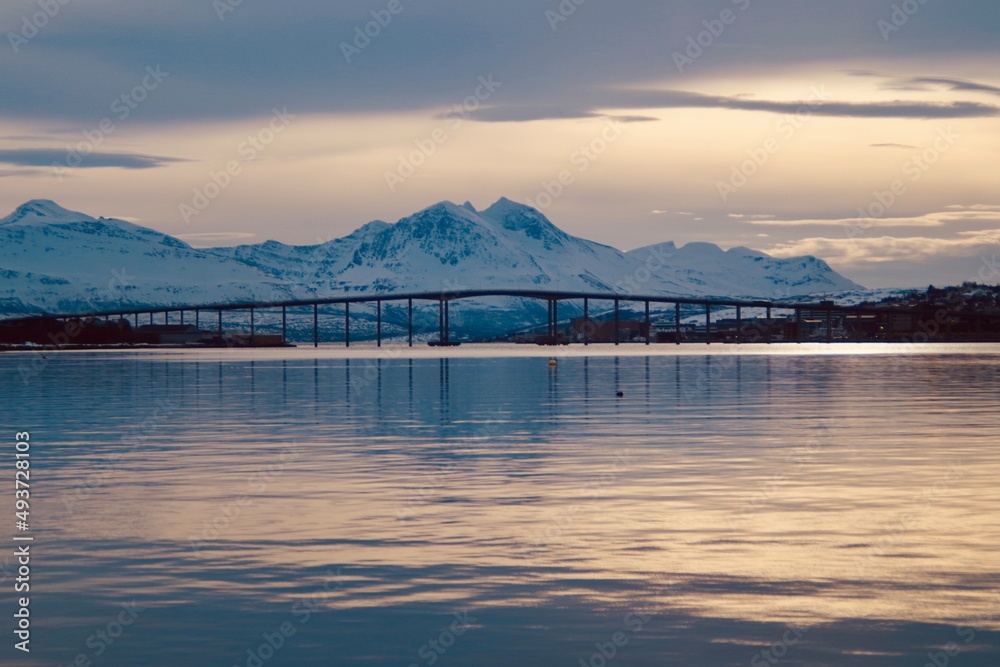 sunset over Tromso Bridge on a sunny winters day
