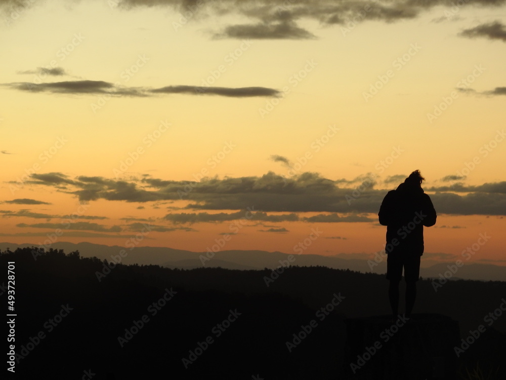 Silhouette of a Person on a Sunset