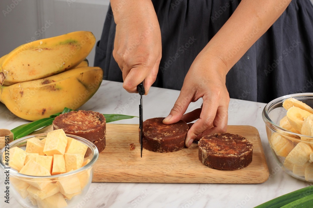 Slicing Palm Sugar Block, Process Making Kolak, Traditional Indonesian