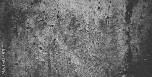 Black grainy stone texture backgroundor dark gray textured background.