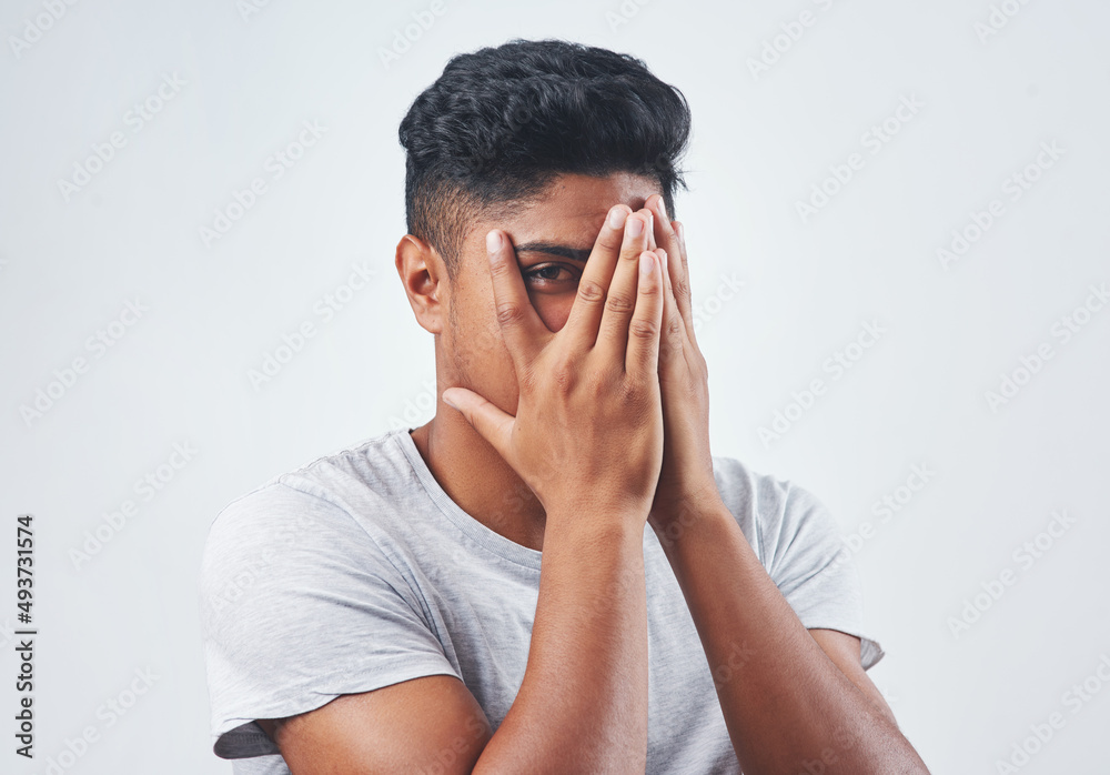 Lets go a bit deeper than appearance. Studio shot of a young man posing against a white background. Lets go a bit deeper than appearance. Studio shot of a young man posing against a white background.