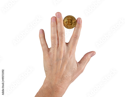 Woman hand holding bitcoin coin between fingers isolated on white background. Cryptocurrency, digital money concept. High quality photo