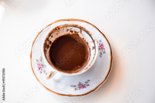 cup of Turkish coffee, traditionally using for fortune telling. traditional porcelain turkish coffee cup © Birol