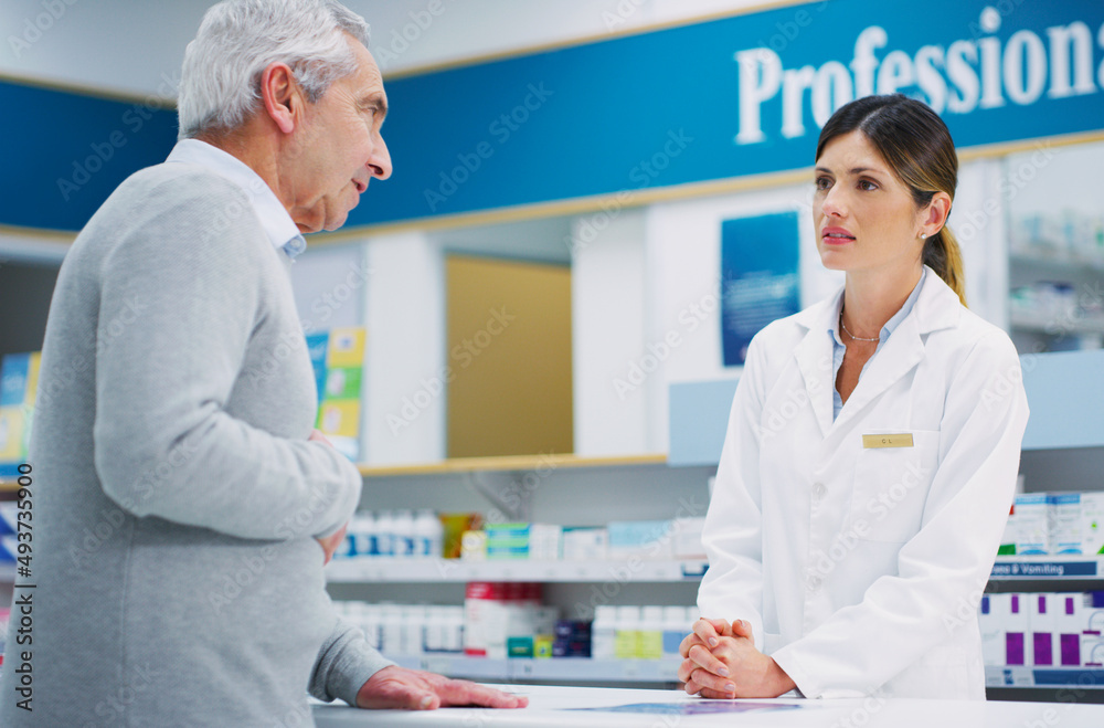 Our interactions with patients can truly change and save lives. Shot of a pharmacist assisting a customer in a chemist.