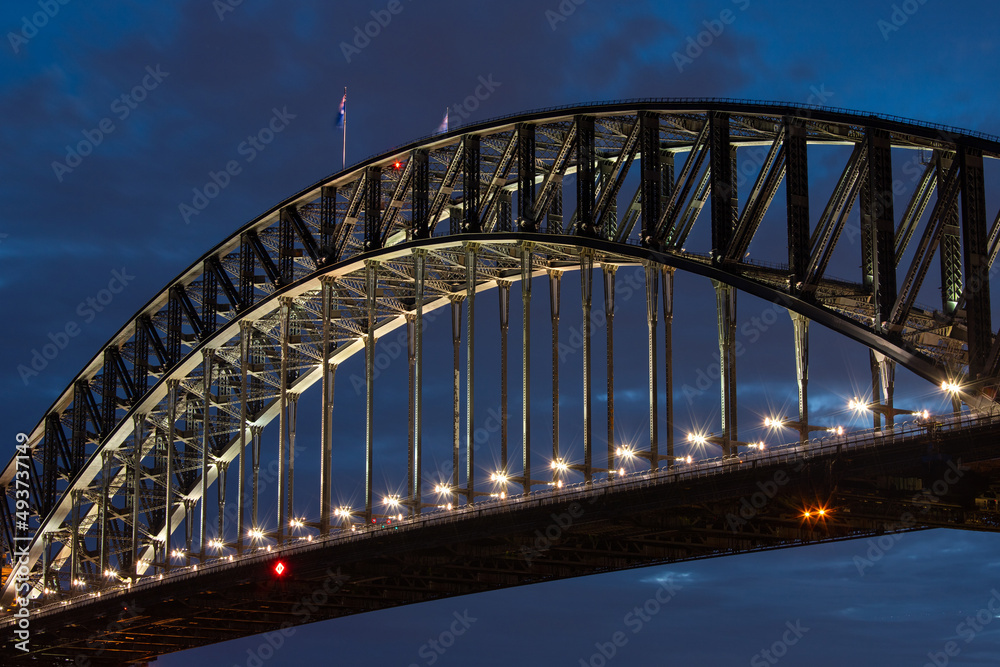 Night view of Sydney Harbour Bridge.