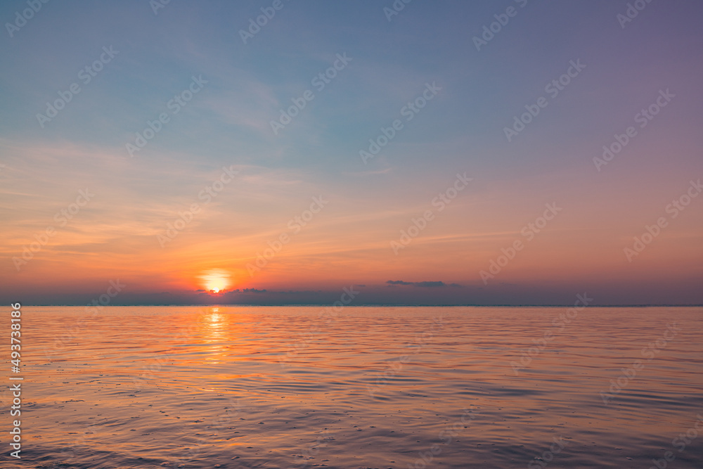 Colorful sky ocean beach sunrise with dramatic motivational mood. Tropical island seaside, coastal landscape, exotic beach shore, sea horizon. Inspire happy closeup of sand, beautiful summer travel