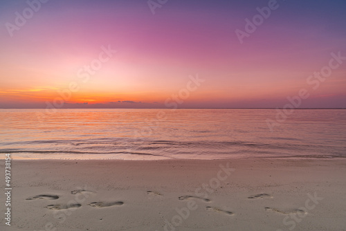 Colorful sky ocean beach sunrise with dramatic motivational mood. Tropical island seaside  coastal landscape  exotic beach shore  sea horizon. Inspire happy closeup of sand  beautiful summer travel