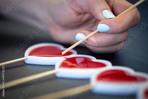 Close-up, the process of making lollipops from natural ingredients.