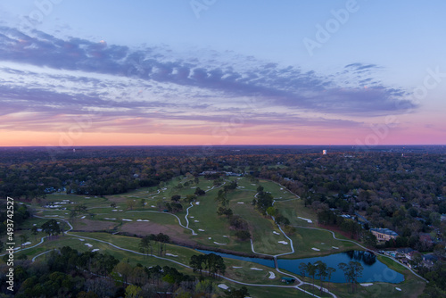 sunset over the country club golf course 