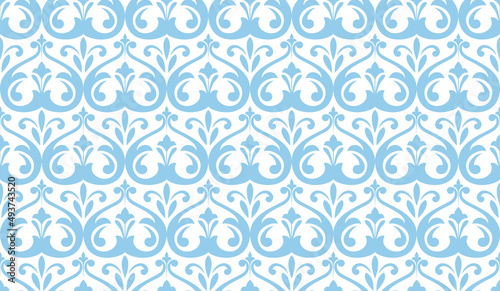 Wallpaper in the style of Baroque. Seamless vector background. White and blue floral ornament. Graphic pattern for fabric, wallpaper, packaging. Ornate Damask flower ornament