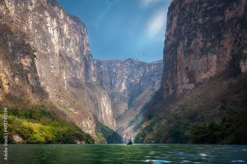 The Sump Canyon is the most spectacular part of the Sumidero Canyon where the waters of Grijalva River are deepest and the canyon walls reach up to 1,000 meters high -located in Chiapas -South Mexico. photo