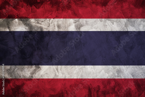 Thai flag on concrete cement wall textured background