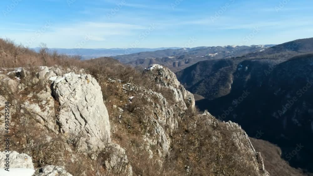 Beautiful view on rocks hills and valley from peak at river Brnjica canyon. Eastern Serbia.
Beautiful view on rocks hills and valley from peak at river Brnjica canyon. Eastern Serbia.