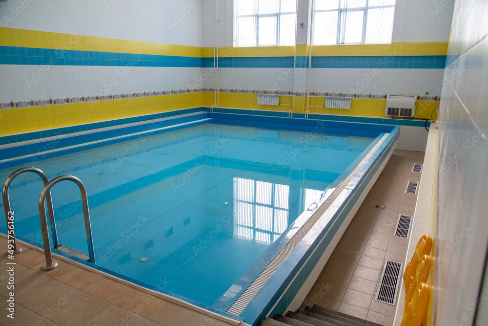 Fototapeta premium Sports pool with blue water