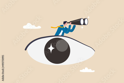 Business vision, eye looking for opportunity or discover success idea, leadership visionary look forward for future, search for success concept, businessman look through binoculars from his big eye. photo