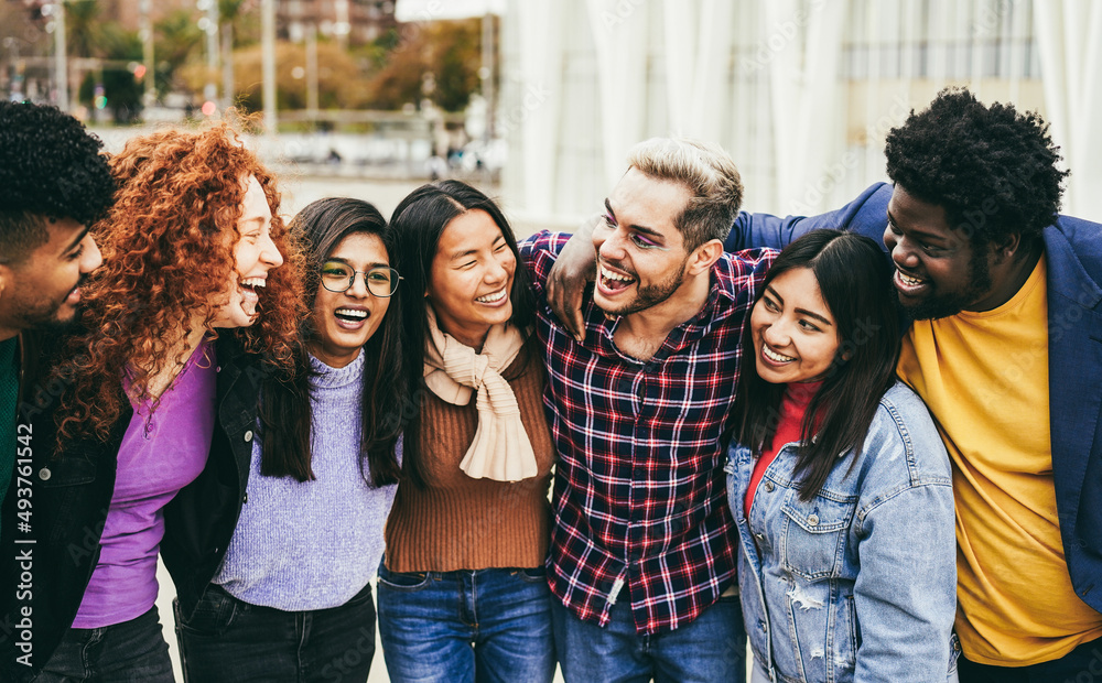Fototapeta premium Young diverse people having fun outdoor laughing together - Diversity concept - Main focus on gay man face