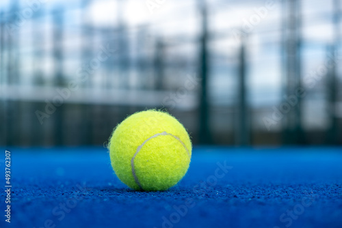 Selective focus.Bright blue tennis, paddle ball or pickleball court close up of service line outdoors.