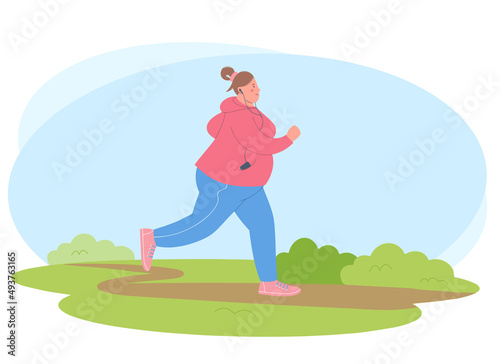 Young overweight woman is engaged in sports. Woman is jogging in the park. Concept of healthy lifestyle