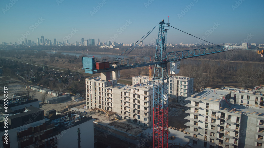 Construction site with crane. Panorama of the city.