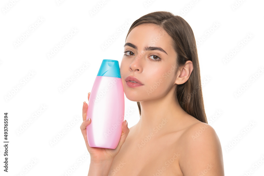 young girl hold shower gel bottle isolated on white background with copy space, shampooing young girl hold shower gel bottle isolated on white background with copy space, shampooing