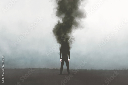 Photographie Illustration of man vanishing in a dark black smoke, surreal emotional concept