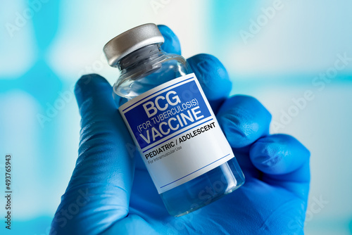 Doctor with vial of the doses vaccine for BCG Bacillus Calmette Guerin against tuberculosis disease. Vaccination for booster shot for BCG Bacillus Calmette Guerin against tuberculosis in the children
