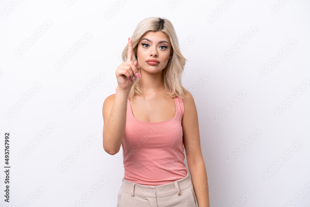 Young Russian woman isolated on white background counting one with serious expression Young Russian woman isolated on white background counting one with serious expression