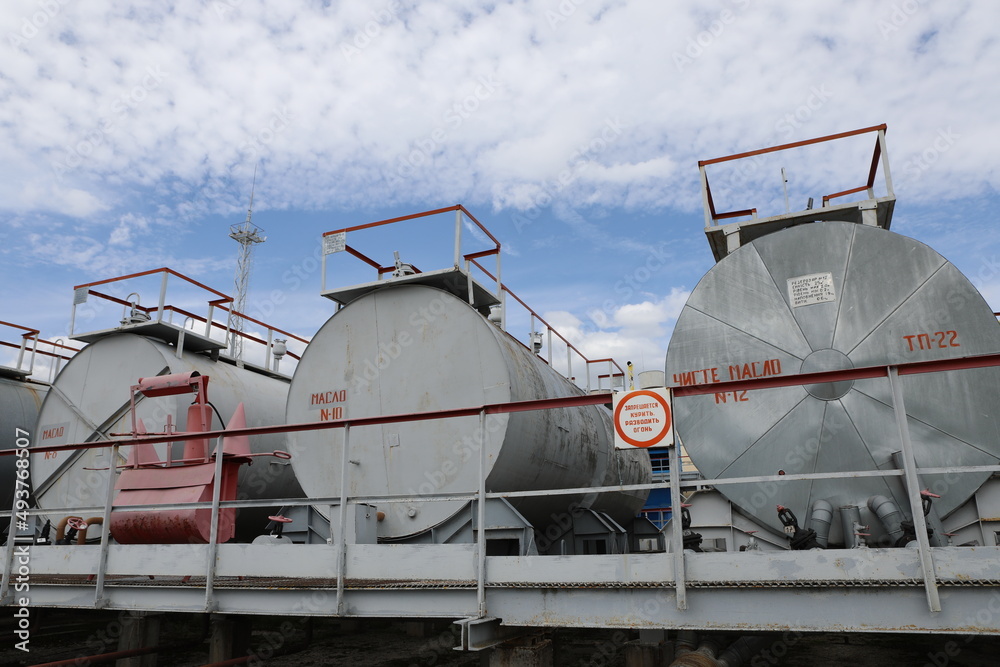 Gas transportation system. Booster pumping station for gas. Gas filling station and gas tanks. Transportation of gas around the world. Oil and gas sector. Gas turbines.