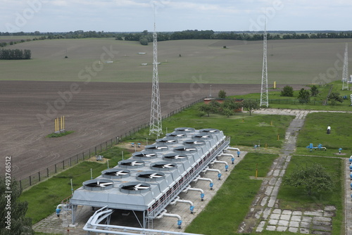 Gas transportation system. Booster pumping station for gas. Gas filling station and gas tanks. Transportation of gas around the world. Oil and gas sector. Gas turbines. photo