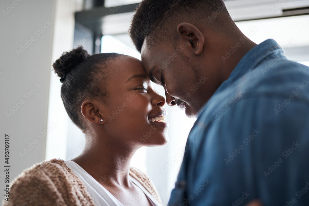 Loving you gives meaning to my days. Shot of an affectionate young couple spending quality time together at home. Loving you gives meaning to my days. Shot of an affectionate young couple spending quality time together at home.