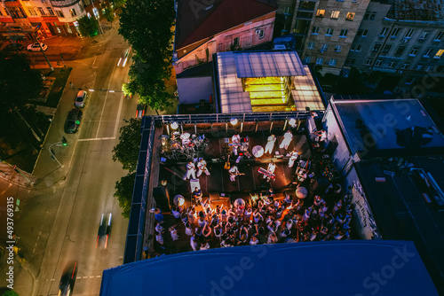 Aerial view on the concert at the roof at night