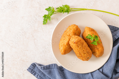 Foto Bolinhos de bacalhau, very famous in Portuguese gastronomy