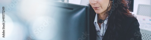 Quadro su tela Call center or customer support agent in broaden view panoramic banner wearing h