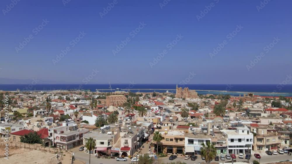 Aerial 4k Famagusta Walled City, old town and Varosha landscapes in North Cyprus surrounded with old streets, shops, touristic sightseeings, mosque, cathedral, castle with a sunny day in Cyprus. Aerial 4k Famagusta Walled City, old town and Varosha landscapes in North Cyprus surrounded with old streets, shops, touristic sightseeings, mosque, cathedral, castle with a sunny day in Cyprus.