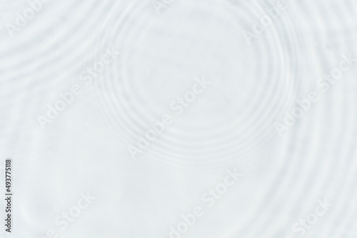 White wave abstract in sunlight or rippled water texture background. Top view, flat lay