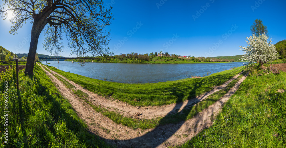 Naklejka premium Amazing spring view on the Dnister River Canyon. View from Nezvysko village blossoming river coast,.Ivano-Frankivsk region, Ukraine