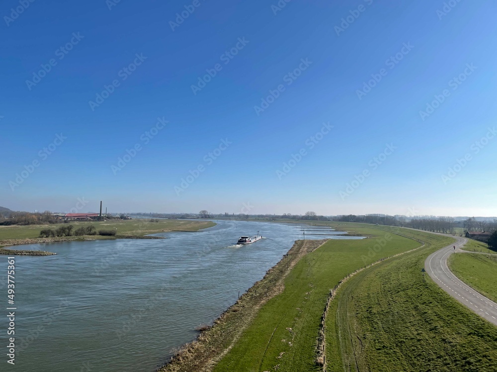 Cargo ship on the river Nederrijn around Heteren