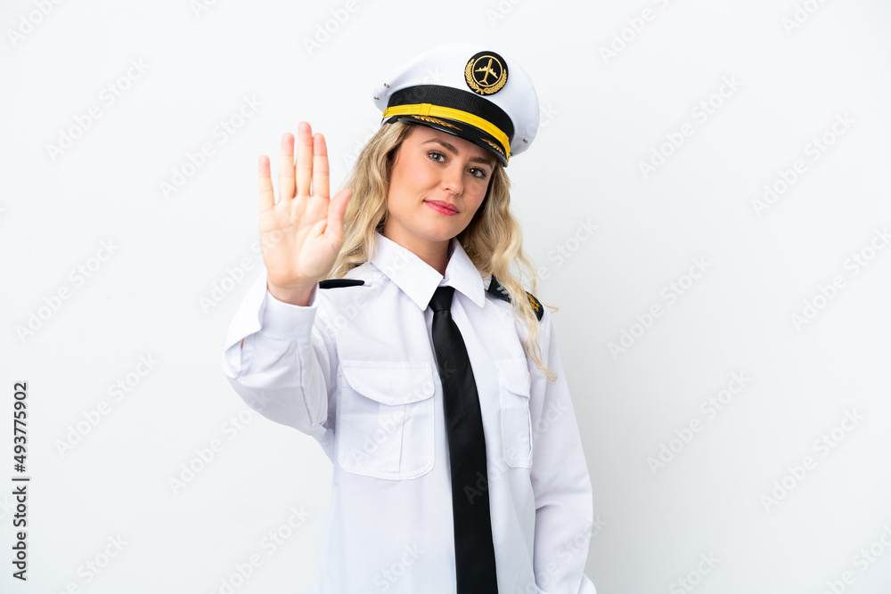 Airplane Brazilian pilot isolated on white background making stop gesture Airplane Brazilian pilot isolated on white background making stop gesture