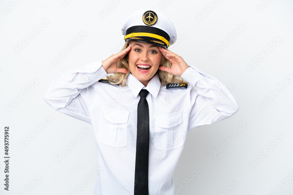 Airplane Brazilian pilot isolated on white background with surprise expression Airplane Brazilian pilot isolated on white background with surprise expression