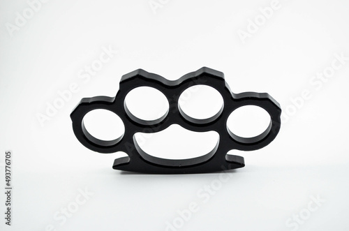 Black Brass Knuckles On The Isolated White Background 