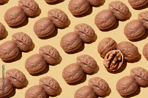 Pattern of walnuts on brown backgrounds