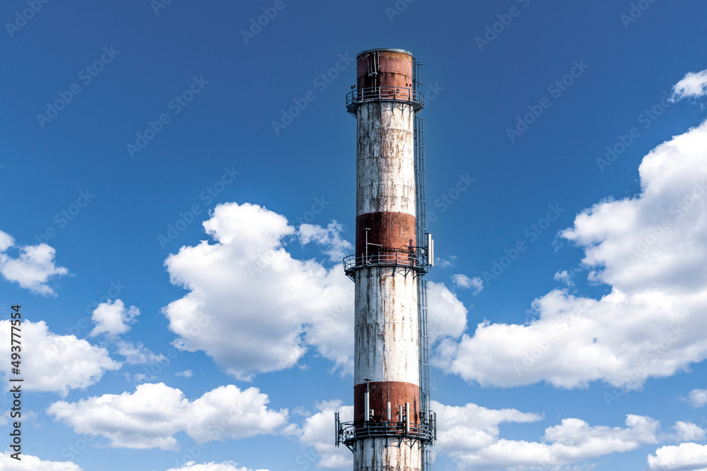 Large red white factory chimney
