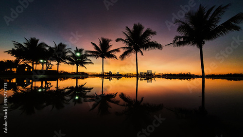 Sunrise reflection in the beach pool © Felipe