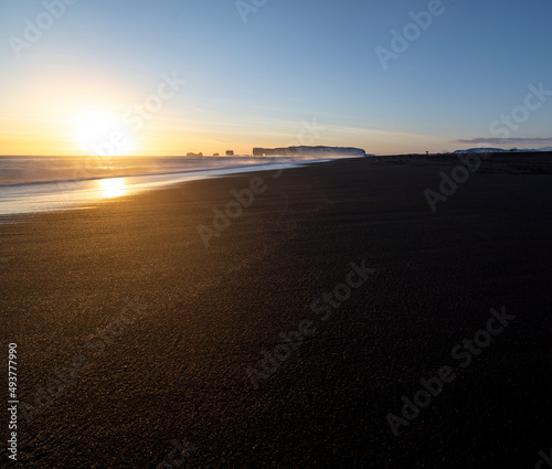 Sunset over the black sand beach in iceland