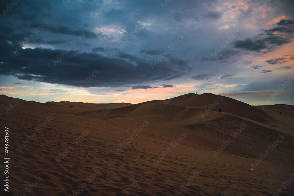 Landscape of the desert in sunset time in a cloudy day. Landscape of the desert in sunset time in a cloudy day.