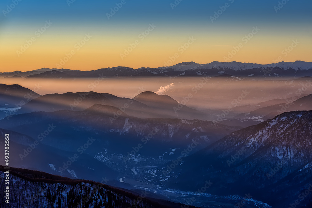 Fototapeta premium view of Chleb in Mala Fatra on snowy slopes during sunrise