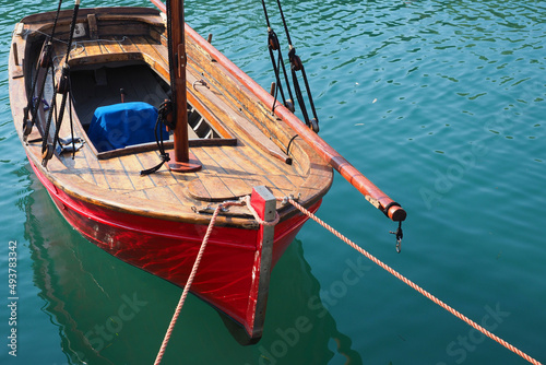 Traditional fishing boat as seen in beautiful Aegean sea Greek island © aerial-drone