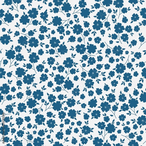 Seamless vintage pattern. blue flowers and leaves. white background. vector texture. fashionable print for textiles, wallpaper and packaging.