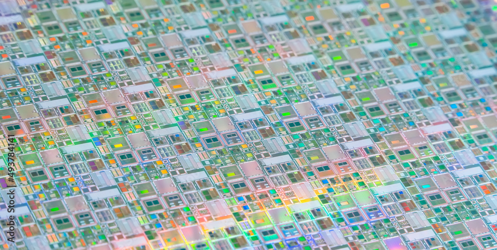 Fototapeta premium Silicon Wafers with microchips used in electronics for the fabrication of integrated circuits