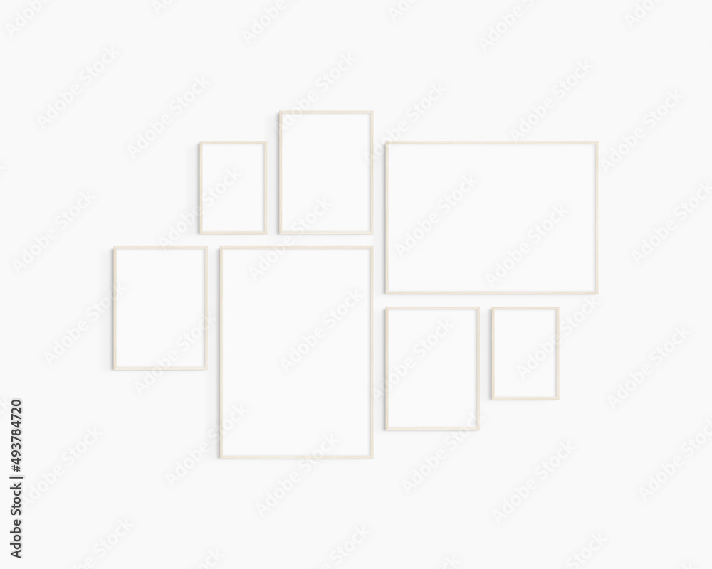 Gallery wall mockup. Set of 7 light wood frames. Gallery wall frame mockup. One 50x70 (5:7), one 70x50 (7:5), three 30x40 (3:4), and two A4 (5:7) wooden frames. Gallery wall mockup. Set of 7 light wood frames. Gallery wall frame mockup. One 50x70 (5:7), one 70x50 (7:5), three 30x40 (3:4), and two A4 (5:7) wooden frames.